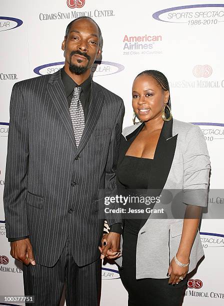 Rapper Snoop Dogg and Shante Taylor arrive at the 25th anniversary of Cedars-Sinai Sports Spectacular at the Hyatt Regency Century Plaza on May 23,...