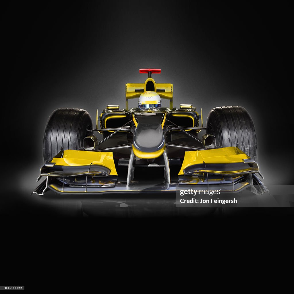 Yellow open-wheel single-seater racing car Car on Black
