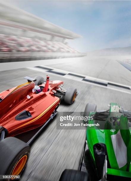 red open-wheel single-seater racing car car winning a race - close to finish line stock pictures, royalty-free photos & images