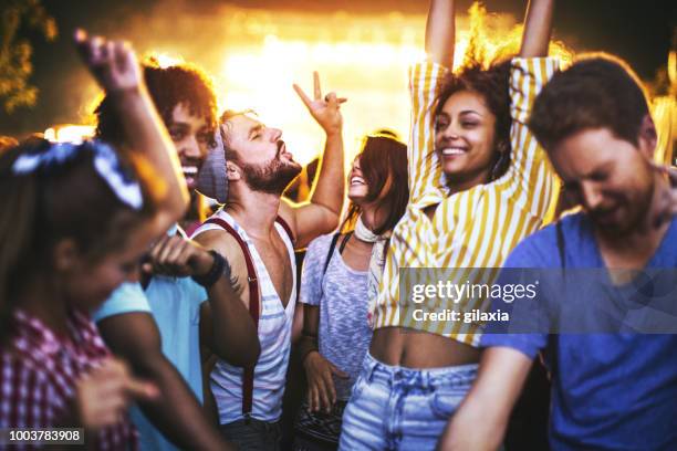 friends dancing at a concert. - white nights festival imagens e fotografias de stock