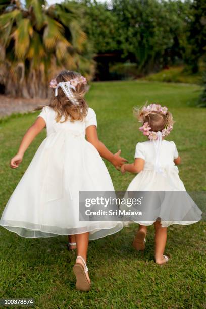 little girls in white dresses running - flower girl stock pictures, royalty-free photos & images