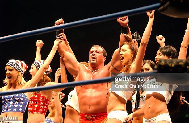 Buff Bagwell and his girls after winning fight during the WWA Wrestling "Inception" fight night held at the Sydney Superdome, Sydney, Australia....