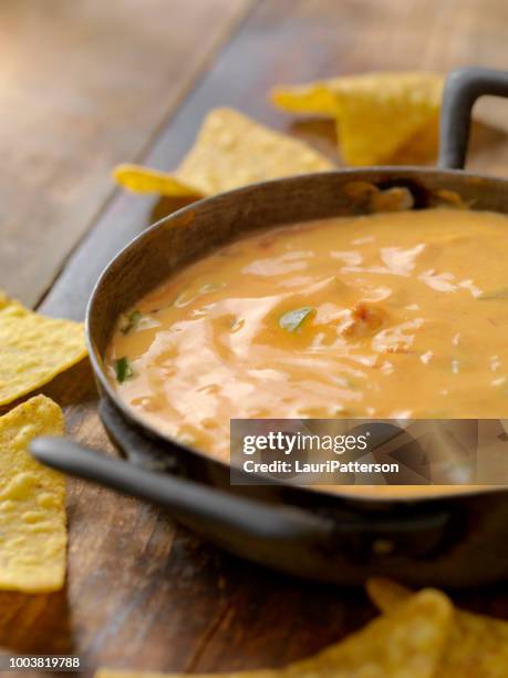 salsa cheese dip - cheese sauce stock pictures, royalty-free photos & images