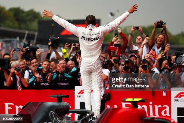 Race winner Lewis Hamilton of Great Britain and Mercedes GP celebrates in parc ferme during the Formula One Grand Prix of Germany at Hockenheimring...