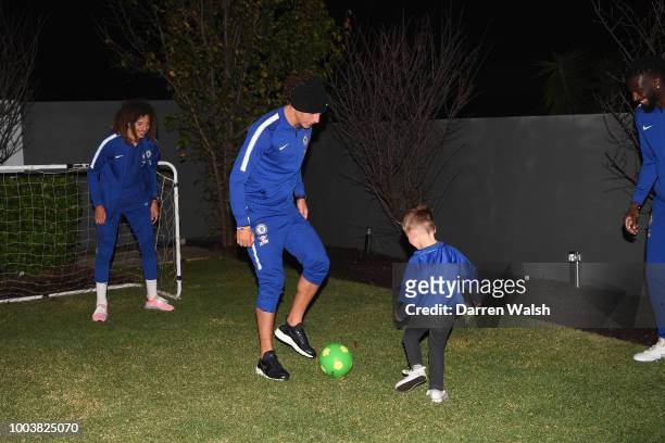 Chelsea's David Luiz, Tiemoue Bakayoko and Ethan Ampadu play football after surprising young Chelsea fan Hudson McCarthy with a visit to his Perth...
