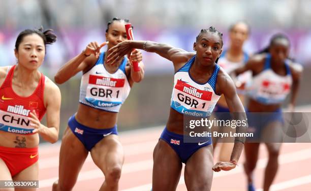 Imani-Lara Lansiquot passes the batton to Bianca Williams of Great Britain during the Womens 4x100m relay during Day Two of the Muller Anniversary...