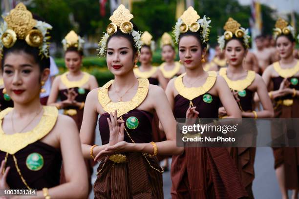 Thai dancer perform during the Buddha relics procession to mark Asanha Bucha Day in Bangkok, Thailand, 22 July 2018.