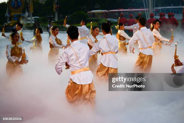 Thai dancer perform during the Buddha relics procession to mark Asanha Bucha Day in Bangkok, Thailand, 22 July 2018.