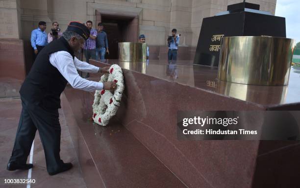 Minister of State for External Affairs VK Singh pays homage to soldiers during an event held in remembrance of soldiers killed in 1999 Kargil war, at...