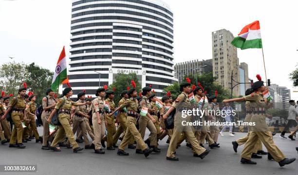 Cadets participate in 'Kargil Parakram Parade' during an event held in remembrance of soldiers killed in 1999 Kargil war, from Central Park Connaught...