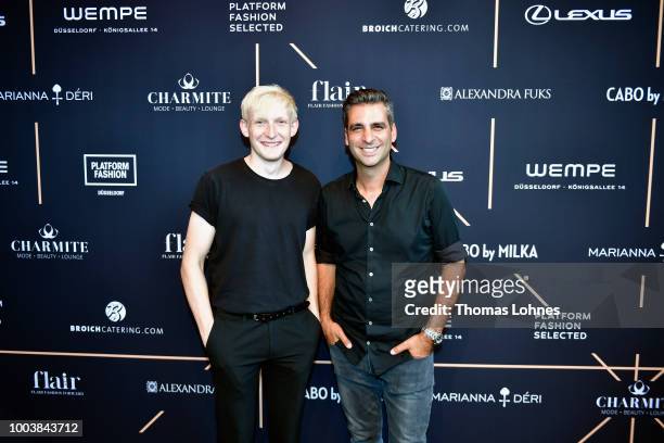 Peer Richter and Manuel Farrokh attend the Platform Fashion Selected show during Platform Fashion July 2018 at Areal Boehler on July 22, 2018 in...