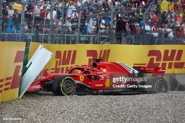 Sebastian Vettel of Germany driving the Scuderia Ferrari SF71H crashes during the Formula One Grand Prix of Germany at Hockenheimring on July 22,...