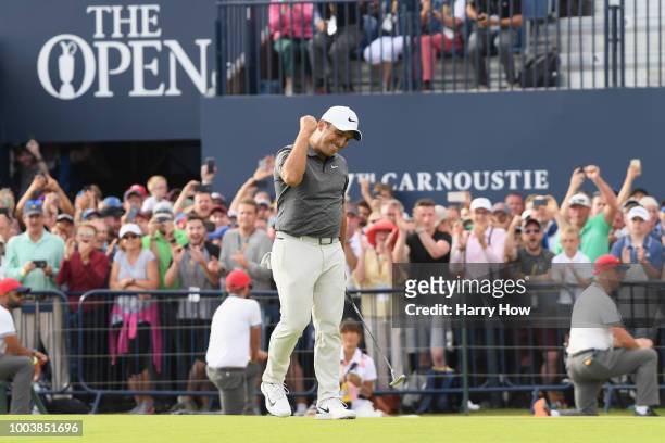 Francesco Molinari of Italy celebrates a birdie on the 18th hole during the final round of the 147th Open Championship at Carnoustie Golf Club on...