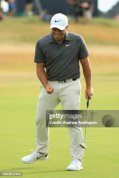Francesco Molinari of Italy celebrates a birdie on the 18th hole during the final round of the 147th Open Championship at Carnoustie Golf Club on...
