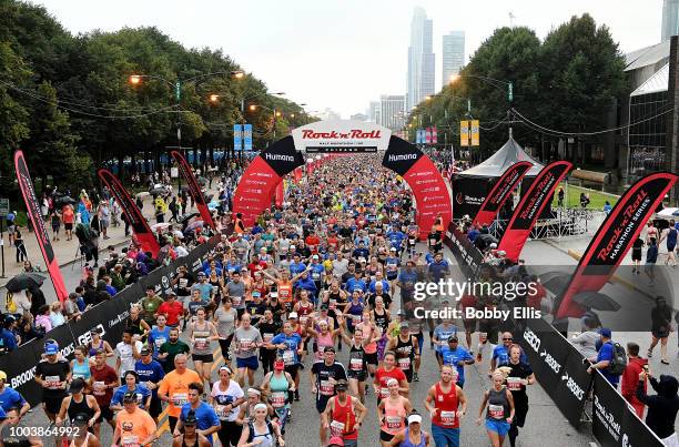 Runners in the Rock "n" Roll Chicago Half Marathon and 10K race leave the starting line on July 22, 2018 in Chicago, Illinois.