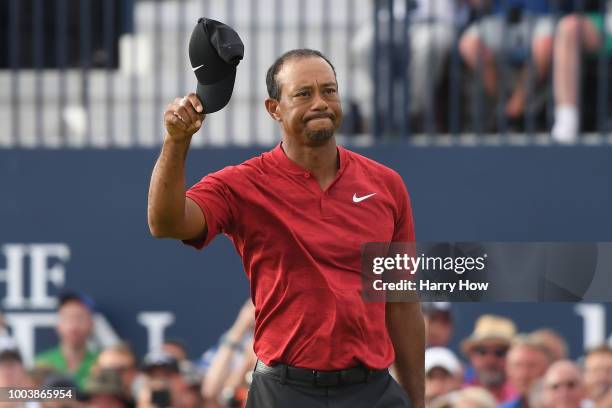 Tiger Woods of the United States acknowledges the crowd on the 18th green during the final round of the 147th Open Championship at Carnoustie Golf...