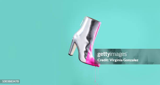 fashion silver boots - silver shoe stock pictures, royalty-free photos & images