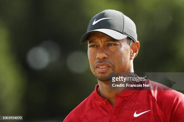 Tiger Woods of the United States walks off the 13th green during the final round of the 147th Open Championship at Carnoustie Golf Club on July 22,...