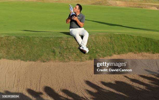 Francesco Molinari of Italy kisses The Claret Jug as Champion Golfer of the Year after the final round of the 147th Open Championship at Carnoustie...