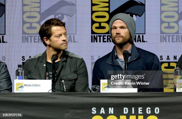 Misha Collins and Jared Padalecki speak onstage at the "Supernatural" special video presentation and Q&A during Comic-Con International 2018 at San...