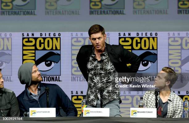 Jared Padalecki, Jensen Ackles and Alexander Calvert speak onstage at the "Supernatural" special video presentation and Q&A during Comic-Con...