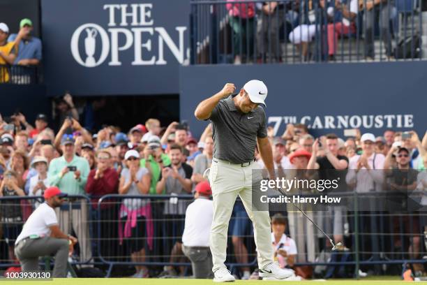 Francesco Molinari of Italy celebrates a birdie on the 18th hole during the final round of the 147th Open Championship at Carnoustie Golf Club on...