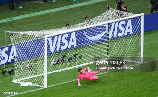 Australia's goalkeeper Maty Ryan fails to prevent Germany's Julian Draxler converting his penalty kick during the Confederations Cup group stages...