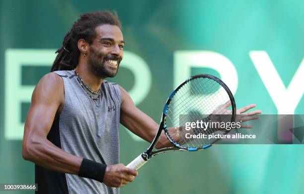 German tennis player Dustin Brown in action during the ATP tennis tournament match against his Canadian opponent Vasek Pospisil in Halle, Germany, 19...