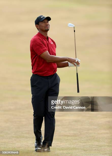 Tiger Woods of the United States plays his second shot on the 15th hole during the final round of the 147th Open Championship at Carnoustie Golf Club...