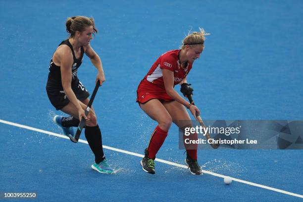 Alix Gerniers of Belgium and Rose Keddell of New Zealand in action during the Pool D game between New Zealand and Belgium of the FIH Womens Hockey...