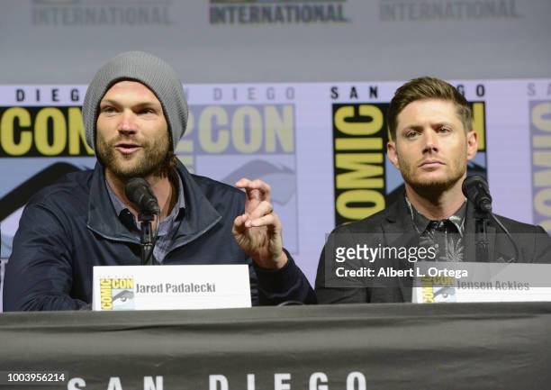 Jared Padalecki and Jensen Ackles speak onstage at the "Supernatural" special video presentation and Q&A during Comic-Con International 2018 at San...