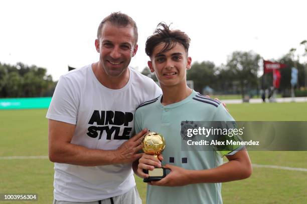 Italian soccer star Alessandro Del Piero gives Giancarlo Lore of FC Bayern Munich a trophy in his victory over Chelsea FC during the International...