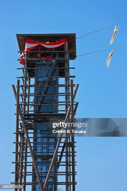 traditional taiko drum tower at ryogoku sumo hall in the downtown sumida district of tokyo, japan - wrestling arena stock pictures, royalty-free photos & images