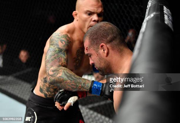 Anthony Smith punches Mauricio Rua of Brazil in their light heavyweight bout during the UFC Fight Night at Barclaycard Arena on July 22, 2018 in...