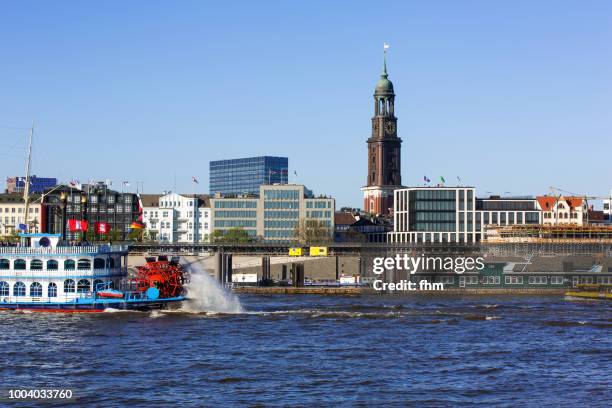 hamburg skyline - st. michaelis church with historic museum ship (hamburg, germany) - metro hamburg stock-fotos und bilder