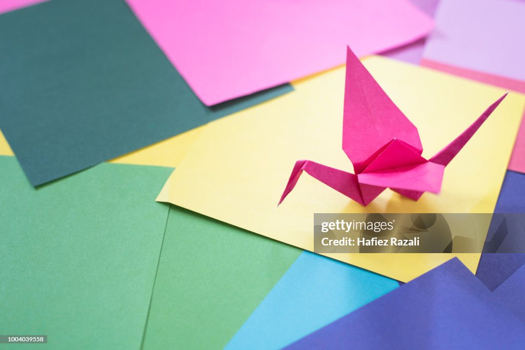 High Angle View Of Origami On Colorful Papers