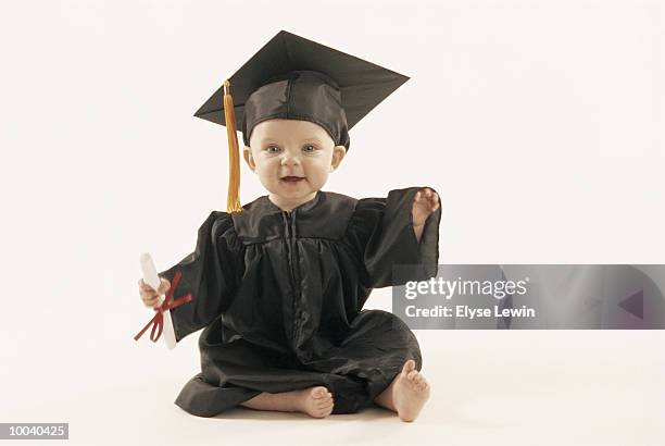 Baby Wearing Graduation Hat Photos and Premium High Res Pictures ...