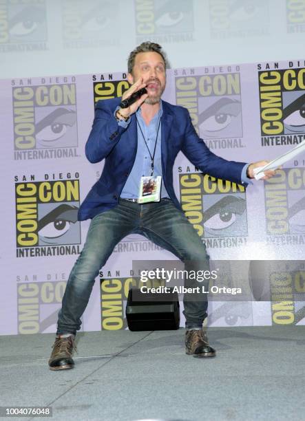 Rob Benedict speaks onstage at the "Supernatural" special video presentation and Q&A during Comic-Con International 2018 at San Diego Convention...