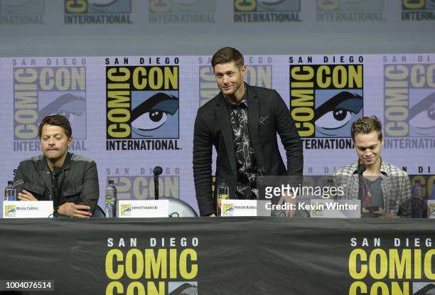 Misha Collins, Jensen Ackles and Alexander Calvert speak onstage at the "Supernatural" special video presentation and Q&A during Comic-Con...