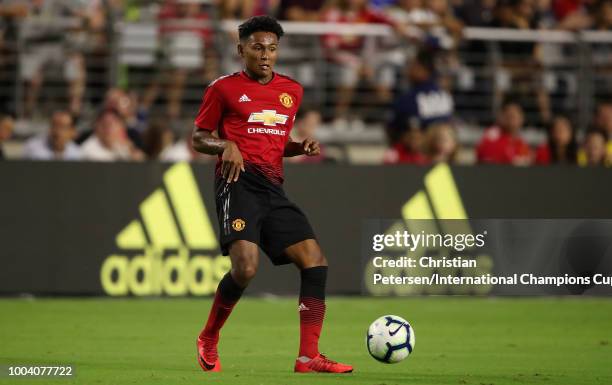 Demitri Mitchell of Manchester United controls the ball during the International Champions Cup game against Club America at the University of Phoenix...