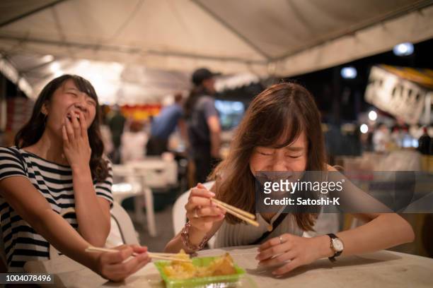 happy food time at night festival - market stall stock pictures, royalty-free photos & images