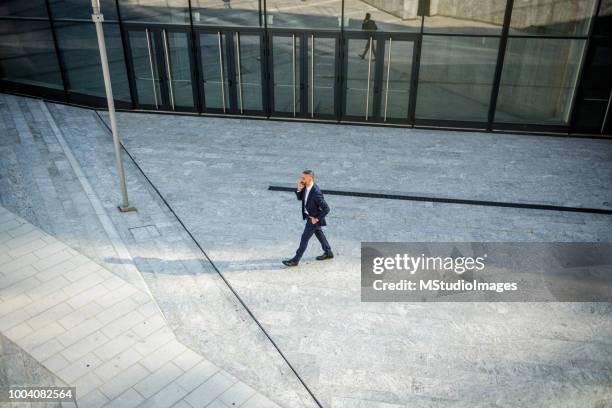 businessman on the phone. - arial view business meeting stock pictures, royalty-free photos & images