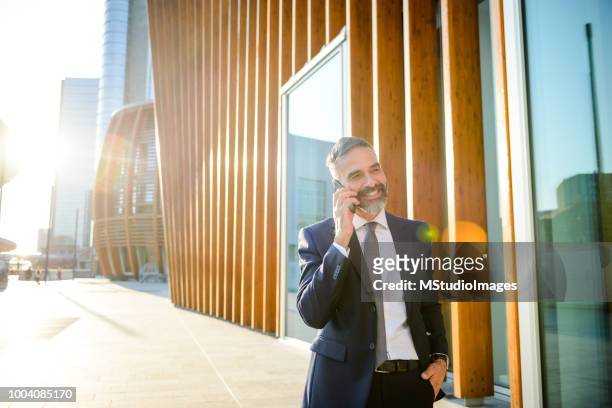 businessman on the phone. - milan business stock pictures, royalty-free photos & images