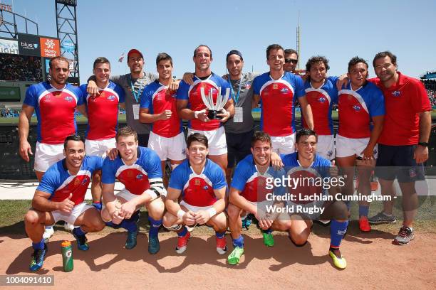 Chile players pose with the trophy after winning their Bowl game against Hong Kong during day three of the Rugby World Cup Sevens at AT&T Park on...