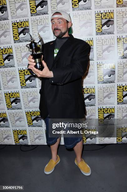 Kevin Smith, recipient of an Inkpot Award, poses at 'An Evening with Kevin Smith' during Comic-Con International 2018 at San Diego Convention Center...