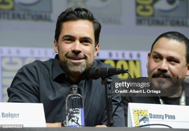 Danny Pino and Emilio Rivera speak onstage at the "Mayans M.C." discussion and Q&A during Comic-Con International 2018 at San Diego Convention Center...