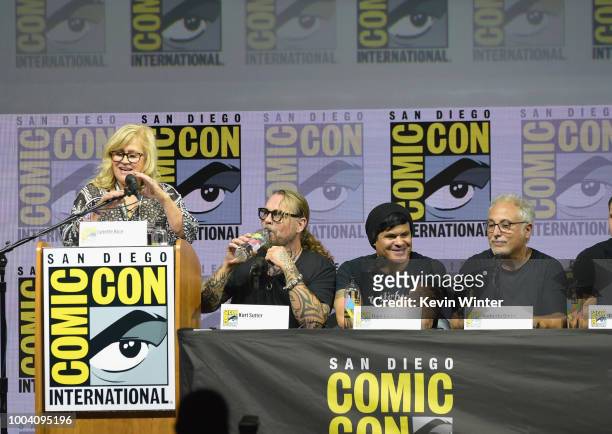 Lynette Rice, Kurt Sutter, Elgin James, and Norberto Barba speak onstage at the "Mayans M.C." discussion and Q&A during Comic-Con International 2018...