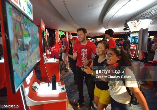 Nintendo of America hosts the ultimate family-fun battle where families compete in Donkey Kong Country: Tropical Freeze at the Nintendo Gaming Lounge...