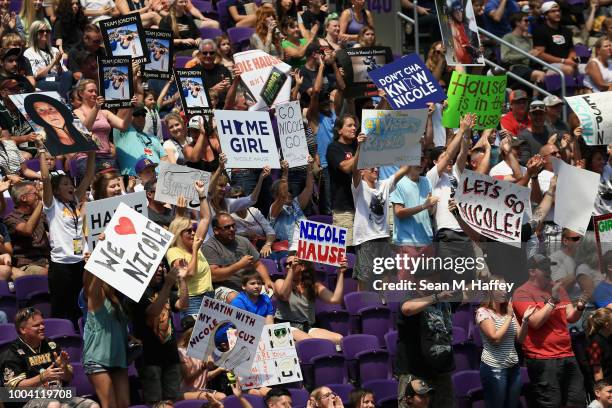 Fans of Nicole Hause cheer during the Women's Skateboard Park Final during the ESPN X Games at U.S. Bank Stadium on July 22, 2018 in Minneapolis,...