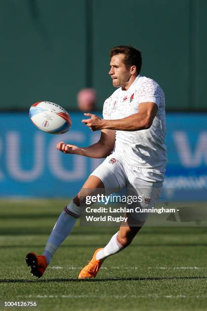 Oliver Lindsay-Hague of England passes the ball during the Championship final match against New Zealand on day three of the Rugby World Cup Sevens at...